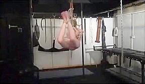 Amateur blonde subbie in suspension bondage