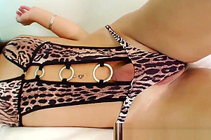 Amazing brunette shemale taking on a big fat dildo