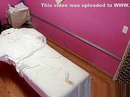 Asian masseuse tugs and sucks client balls