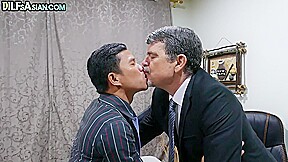 Asian twink barebacked by white business DILF in office