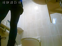 Asiatic women spied in public toilet peeing