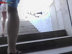 Attractive ass in upskirt thong movie by brunette gal