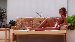 Beauty posing in extreme micro bikini 1
