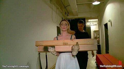 Blonde Carries Heavy Wooden Billets