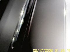 Blonde bimbo trying on to dress in dress room