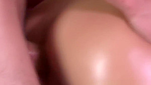 Blonde masseuse giving cock massage in oil
