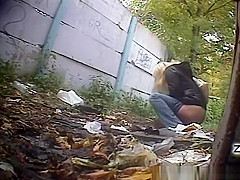 Blonde woman pees twice