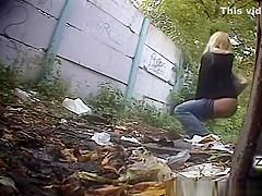 Blonde woman pees twice