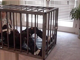 Bondage girl in cage