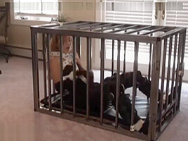 Bondage girl in cage