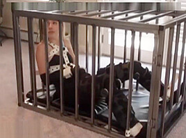 Bondage girl in cage