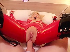 Bondage in Latex for blonde babe