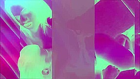 Brunette ladyboy with high heels strokes her fat cock in armchair