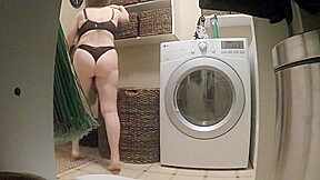Busty mature hottie strips for you