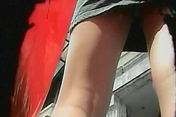 Chubby blonde whore walking the streets in a short skirt and things beneath
