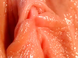 Close up of hot pink wet pussy and clit
