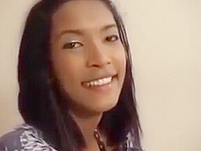 Cute smiling asian ladyboy in solo