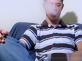 Cute twink smoker squirts cum before finishing cigarette