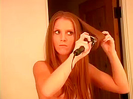 Emma Cute Blonde Babe Does Her Hair In The Bathroom