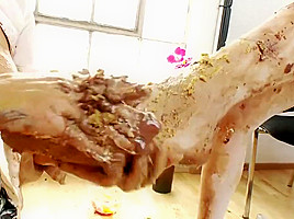 Eva and Mai make out in a messy floor in a close up shoot
