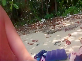 Fucking wife in missionary position on the beach