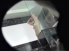 Full bodied female showering on the