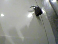 Girl changing in changing room reflecting in the mirror