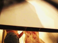 Girl in jeans and bra gets spied from below by