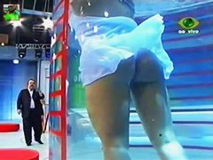 Gorgeous brunette model upskirt on tv