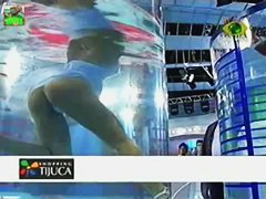 Gorgeous brunette model upskirt on tv