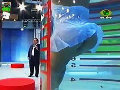 Gorgeous brunette model upskirt on tv