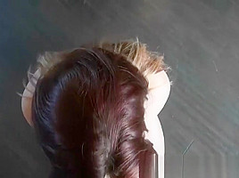 Gorgeous redhead babe with a fantastic ass gags on a cock