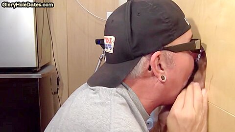 Gray DILF sucks and tugs gloryhole dick until spermed