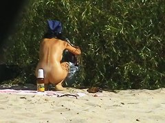 Hot beach candid babes on taking nude sunbaths caught on camera
