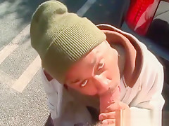 Interracial gay blowjob in public