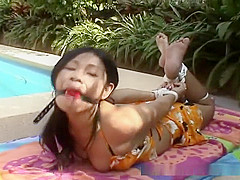 Intruder hogties Asian cutie