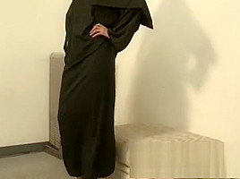 Kinky nun peels off clothes and works her ballbusting magic on a cock