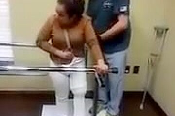 Lak amputee walking whit one crutch