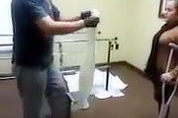 Lak amputee walking whit one crutch