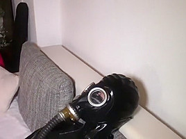 Latex gasmask masturbation
