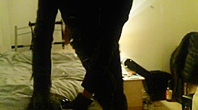 Leather Mistress in high heel boots