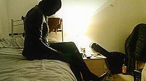 Leather Mistress in high heel boots