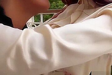 Lesbians pissing and fisting on balcony