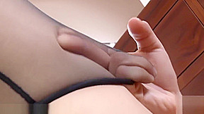 Long legged brunette in sexy stockings masturbating