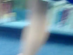 MILF upskirt in library - black panties and pert ass