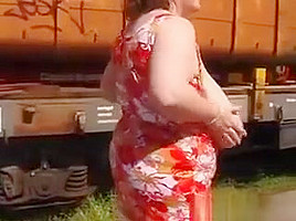 Mature Woman Shows Off Her Tits Outside