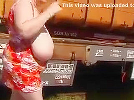 Mature Woman Shows Off Her Tits Outside