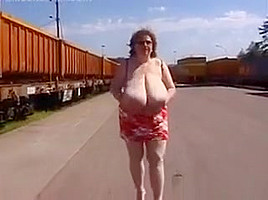 Mature Woman Shows Off Her Tits Outside