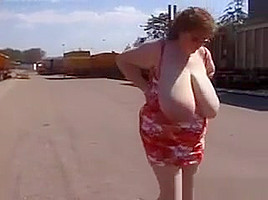 Mature Woman Shows Off Her Tits Outside
