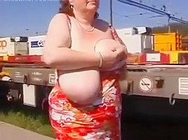 Mature Woman Shows Off Her Tits Outside